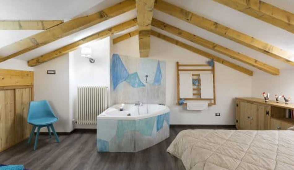appartamento vacanze genzianella camera da letto con vasca